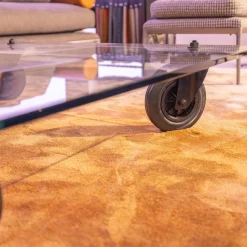 Couchtisch Tavola con Ruota Grande, Design Gea Aulenti 1980, geschliffenes Glas 15 mm, Gestell Rollen schwarz