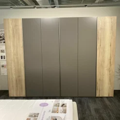 Drehtürenschrank Airline 100 Eiche Silea Front Lack Terrabraun Matt