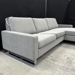 Ecksofa Conseta Stoff 8159 Mittelgrau Metallkufen Verchromt