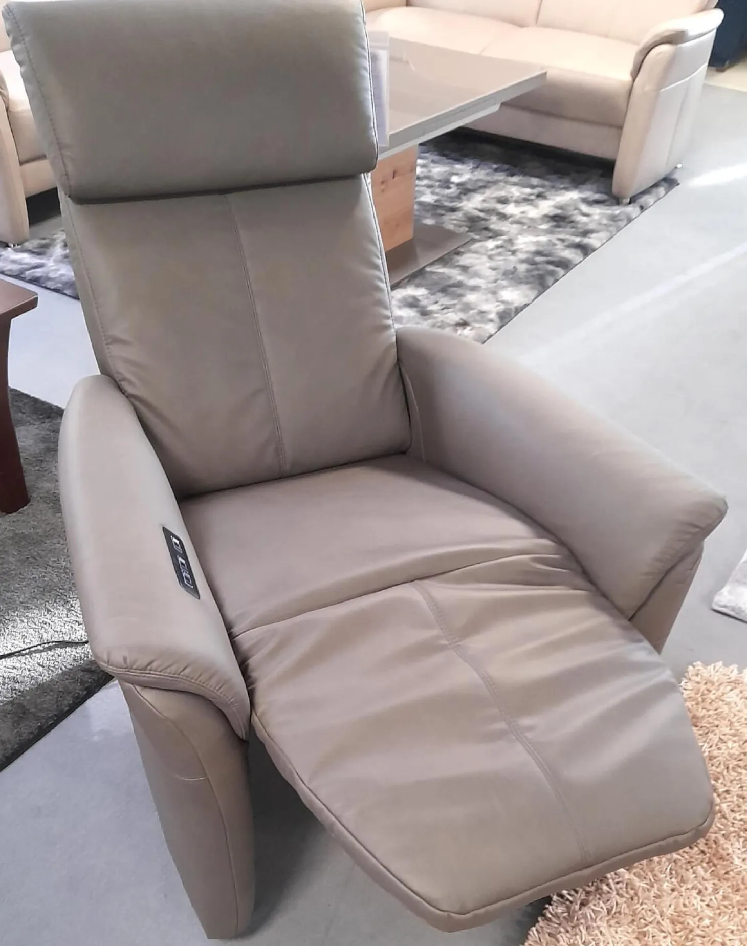 Relaxsessel 50025 Stoff Frisco Kiesel Grau Fuß Rollen