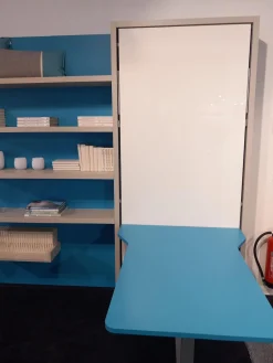 Systemwand Telemaco Strukturlack Canapa Hellblau Und Weiss Mit LED Beleuchtung Und Intrigierten Klappbett Ohne Dekoration